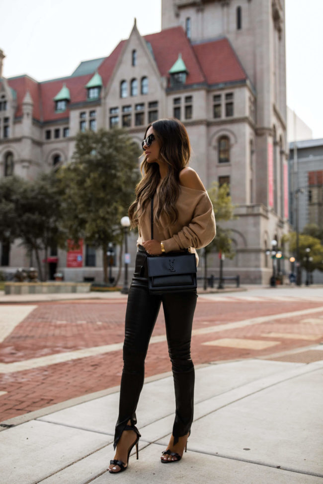 fashion blogger mia mia mine wearing a camel off the shoulder sweater from intermix for fall