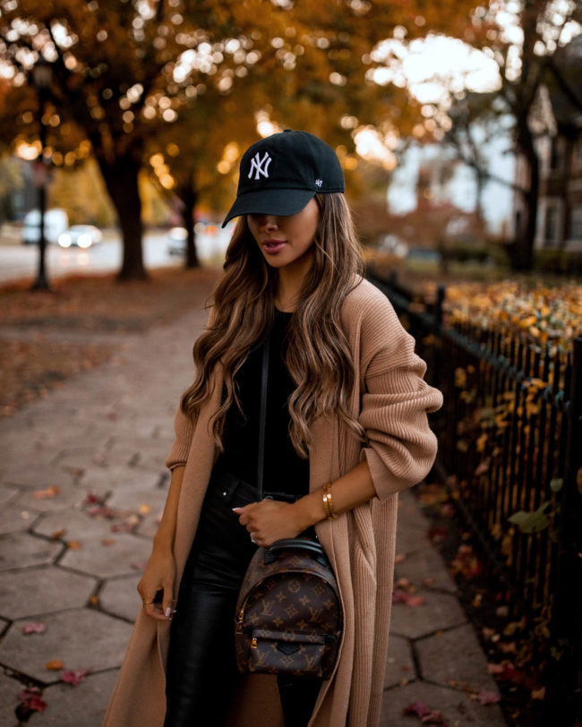 fashion blogger mia mia mine wearing a camel coat from mango for fall