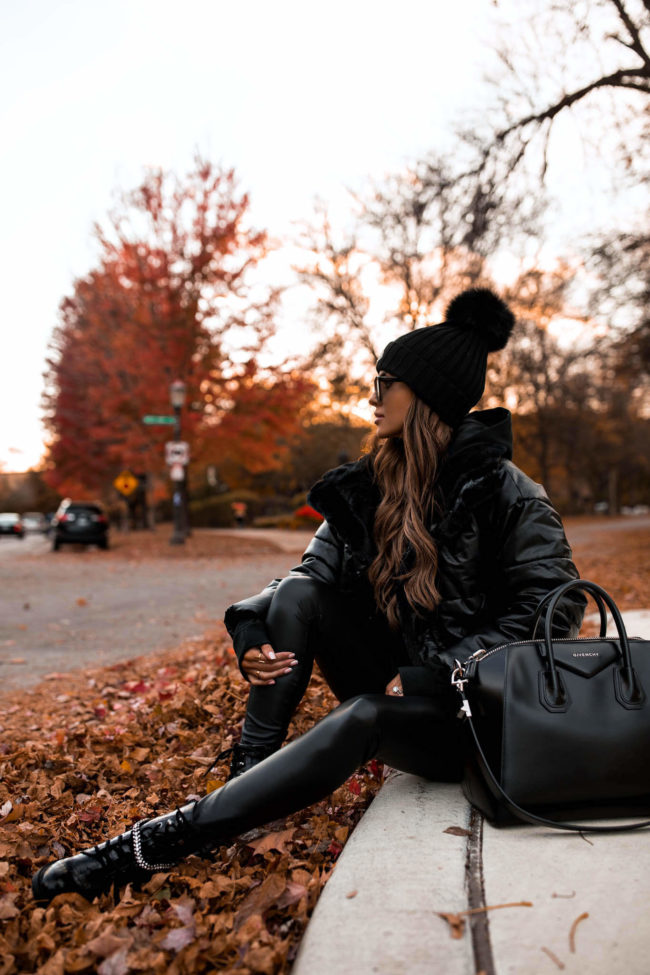 fashion blogger mia mia mine wearing a black outfit from express for fall