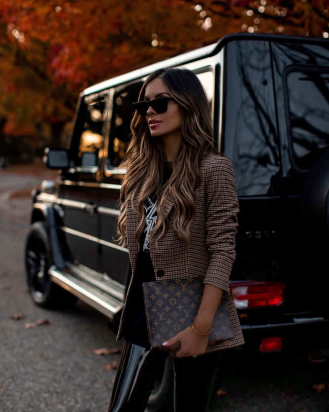 fashion blogger mia mia mine wearing a plaid blazer from express for fall
