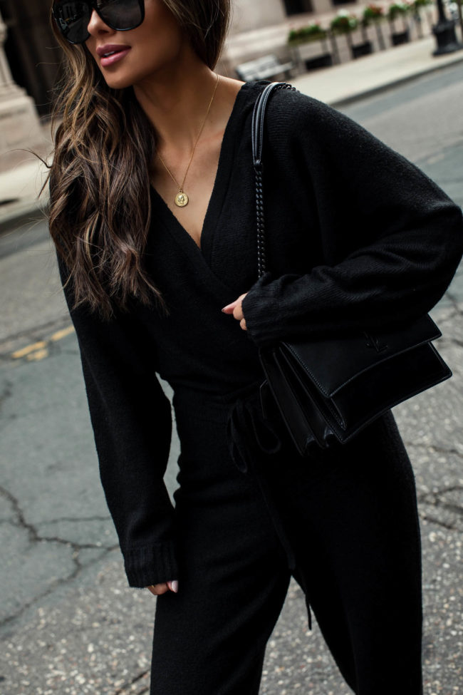 fashion blogger wearing a black sweater set from walmart