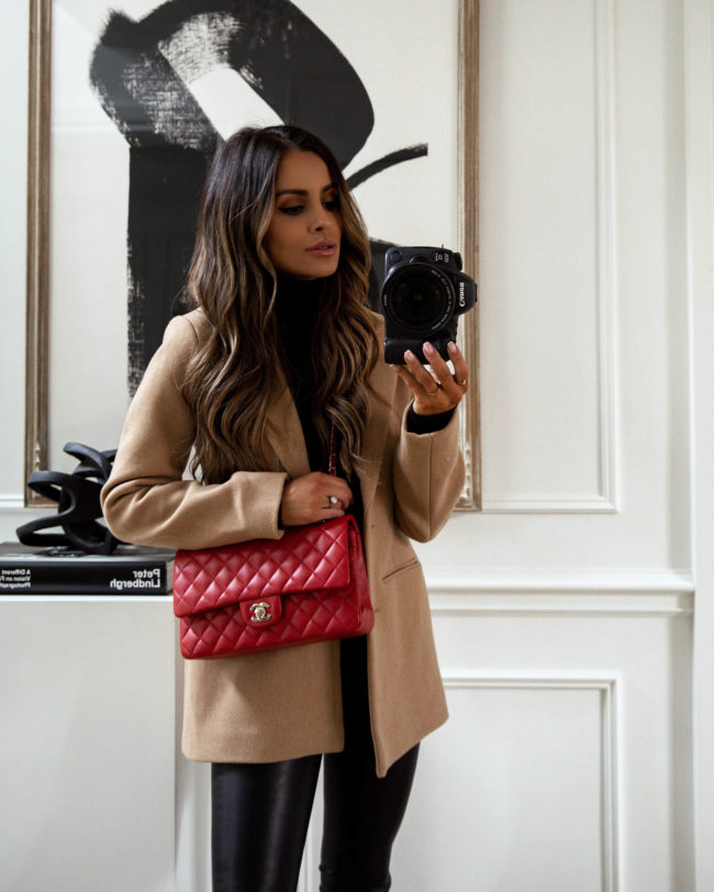 mia mia mine wearing a chanel red bag with a camel blazer coat for fall