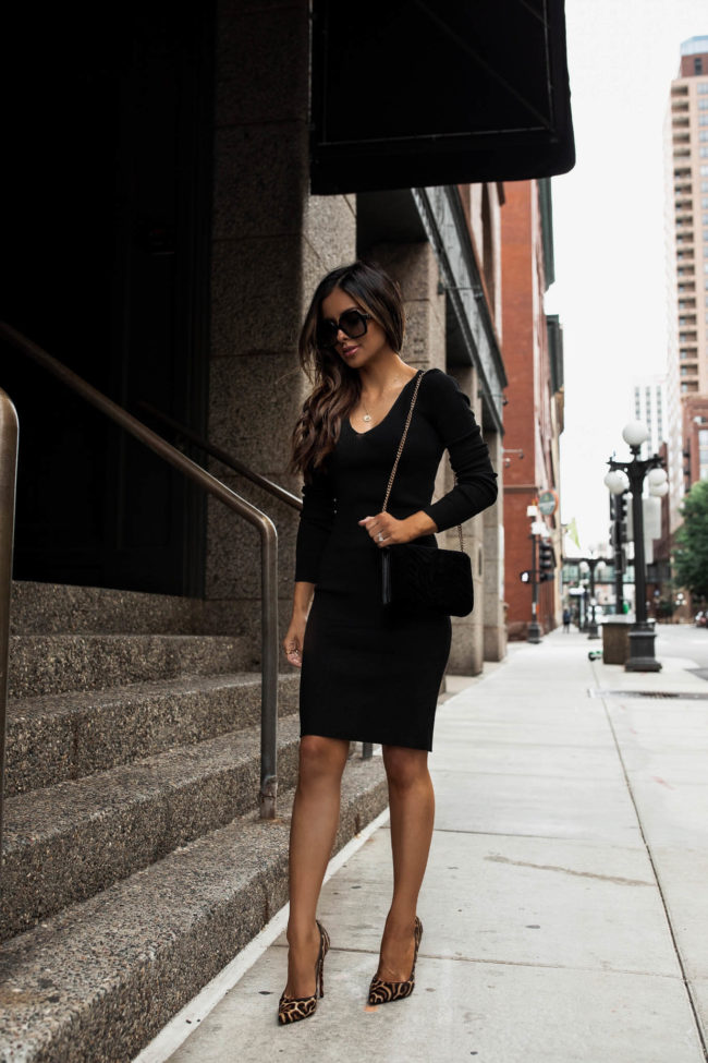 fashion blogger mia mia mine wearing a black dress by sofia jeans at walmart