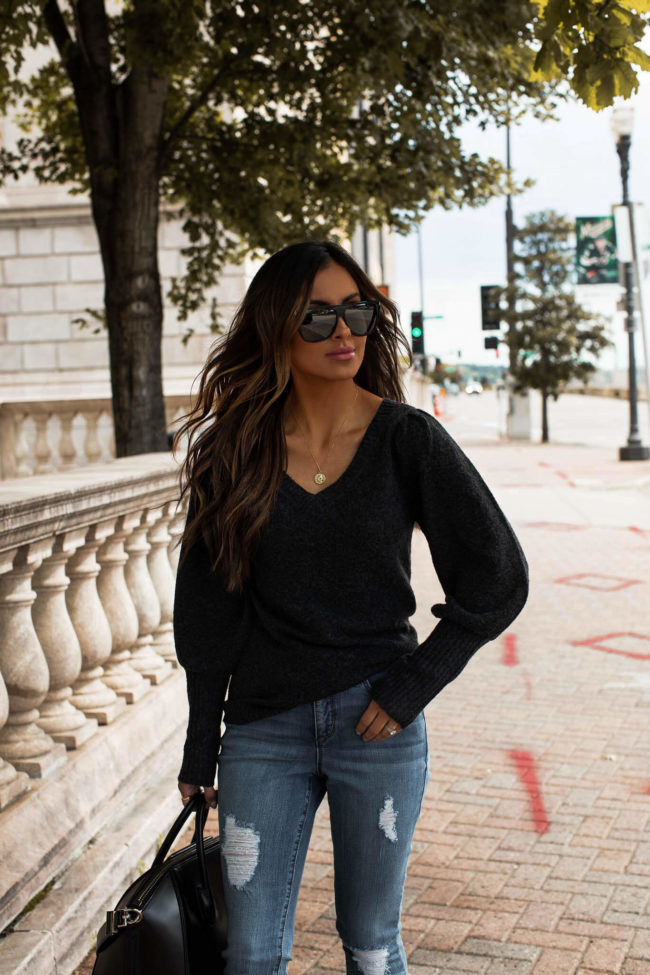 fashion blogger wearing a v-neck sweater and denim from walmart for fall