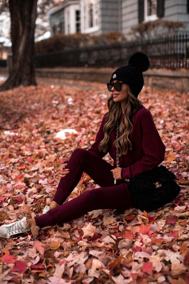 fashion blogger mia mia mine wearing a sweatwsuit from revolve for fall
