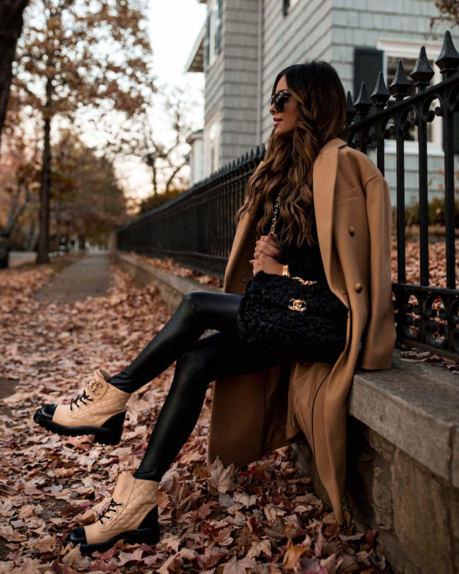 fashion blogger mia mia mine wearing beige chanel combat boots