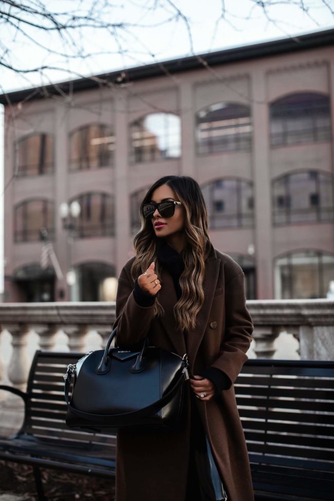 mia mia mine wearing a brown wool coat for winter