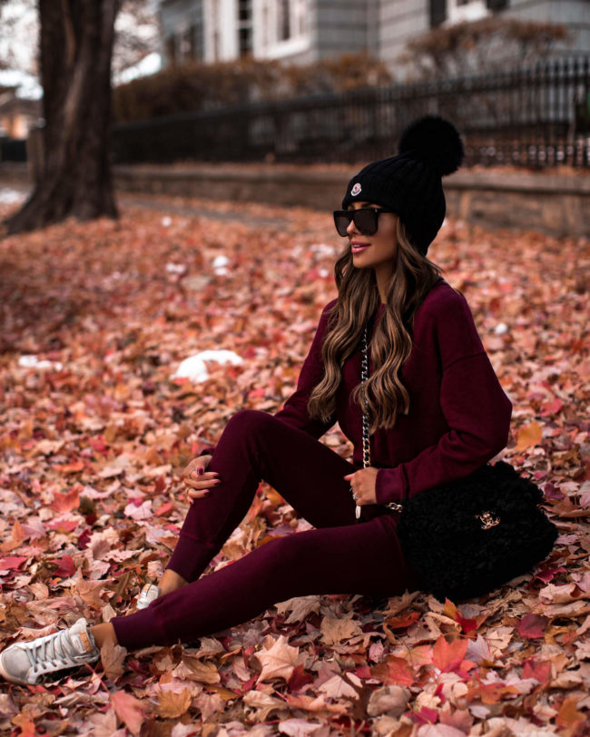 fashion blogger mia mia mine wearing a sweatwsuit from revolve for fall