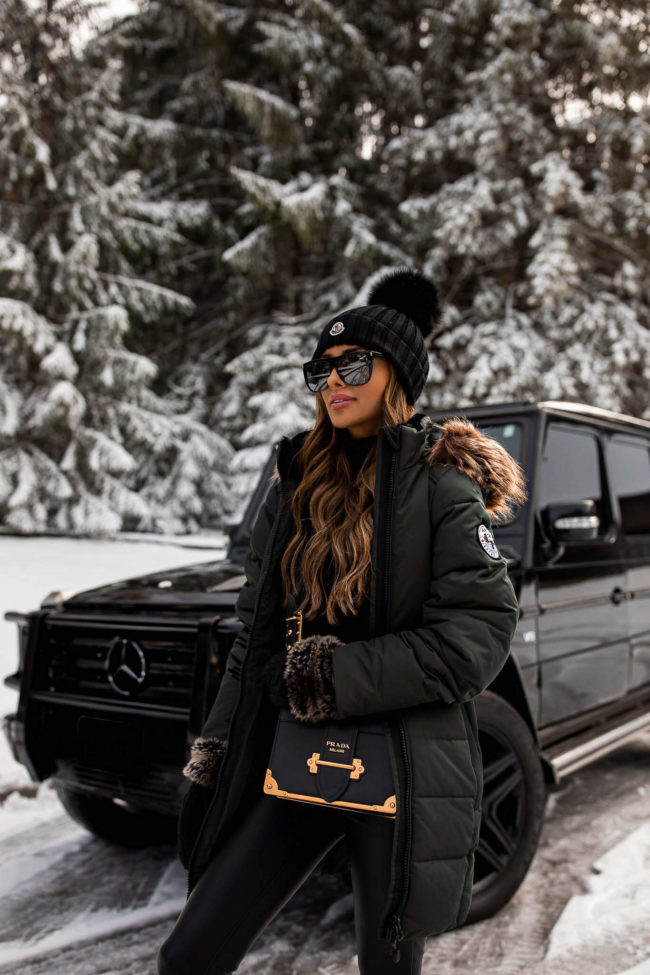 fashion blogger mia mia mine wearing a qvc arctic coat for winter