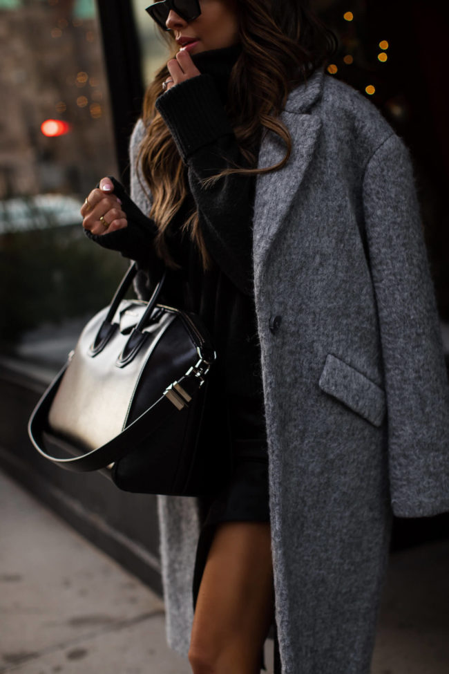 mia mia mine wearing a gray winter coat from express