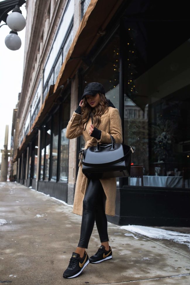 fashion blogger mia mia mine wearing a givenchy antigona bag and a camel hair coat from nordstrom