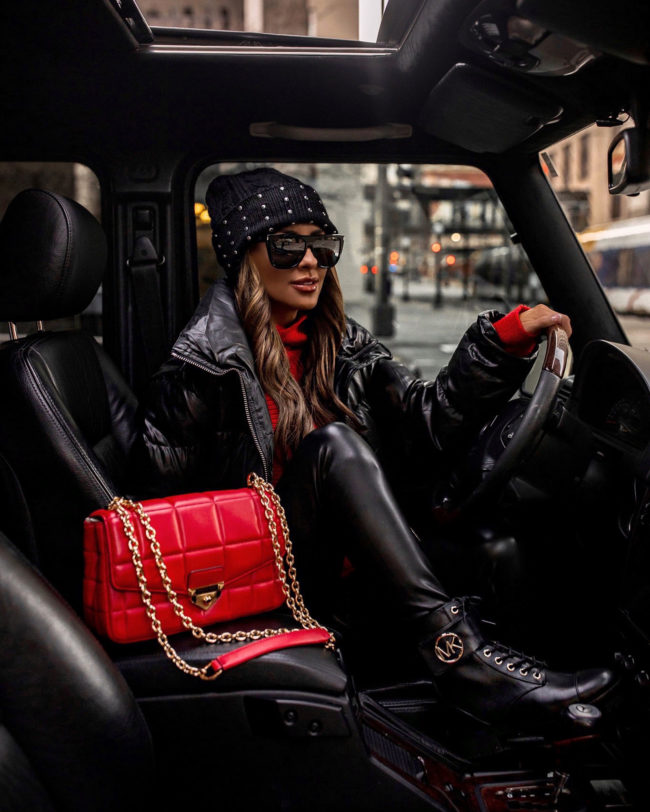 fashion blogger mia mia mine wearing a winter outfit from michael kors