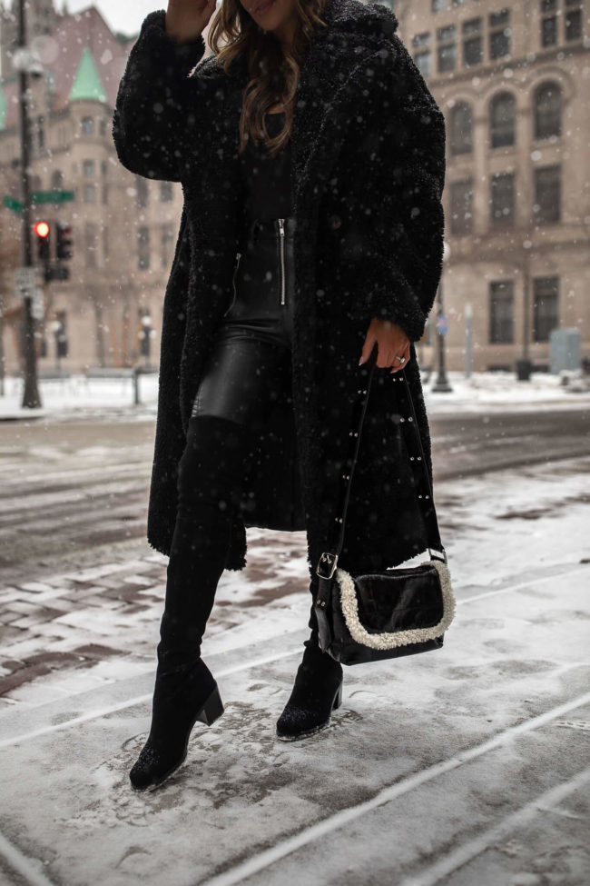 fashion blogger wearing a topshop faux shearling bag
