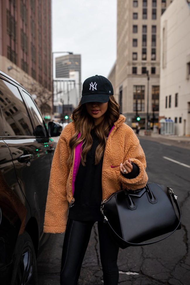 fashion blogger mia mia mine wearing an athleisure outfit from nordstrom