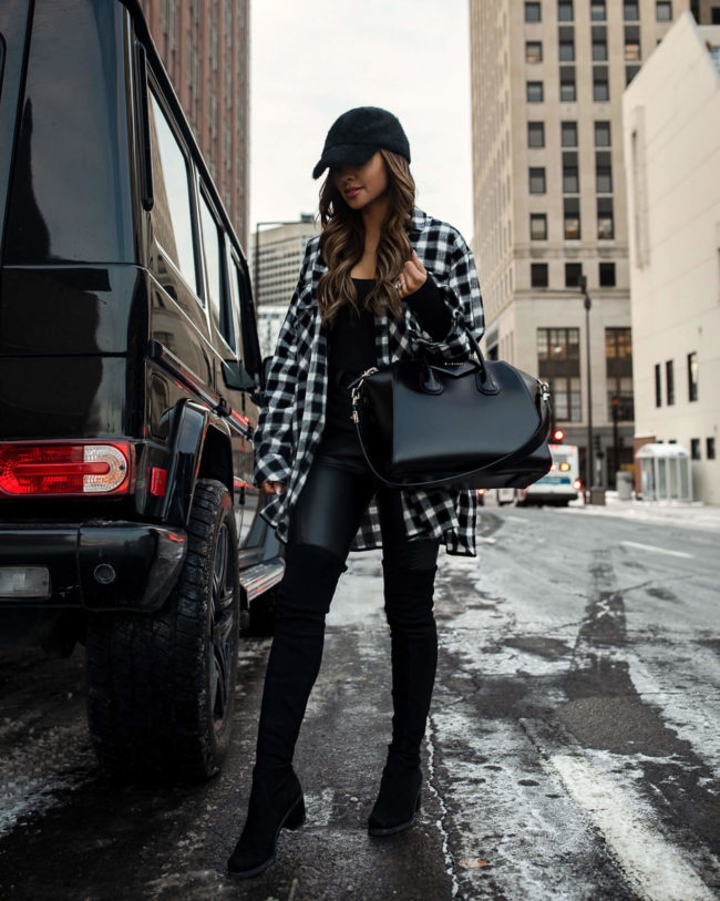 fashion blogger mia mia mine wearing a black and white plaid shirt and faux leather pants from nordstrom