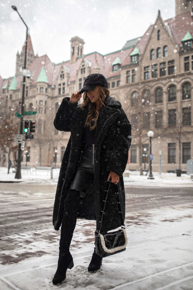 fashion blogger mia mia mine wearing a black teddy bear coat from nordstrom