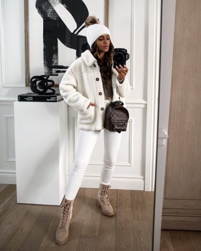 fashion blogger mia mia mine wearing a winter white outfit from goodnight macaroon
