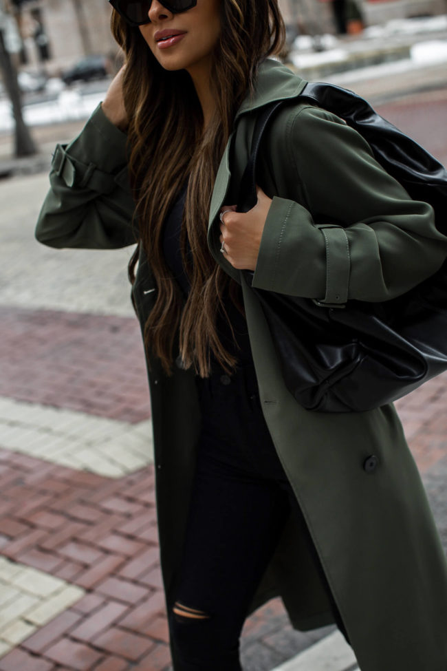 fashion blogger mia mia mine wearing a trench coat and body contour bodysuit from express