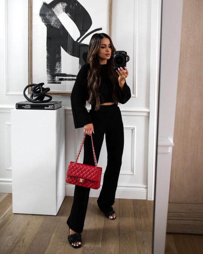 fashion blogger mia mia mine wearing a black knit set from forever 21