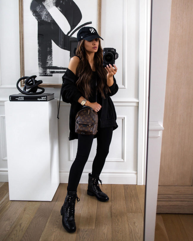 mia mia mine wearing a black jumpsuit from forever 21