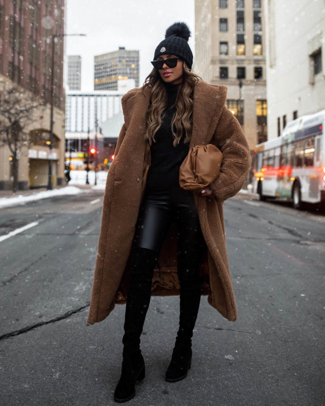 fashion blogger mia mia mine wearing a max mara teddy bear coat for winter