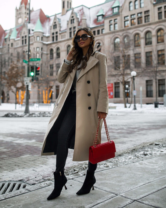 fashion blogger wearing a trench coat from saks off 5th
