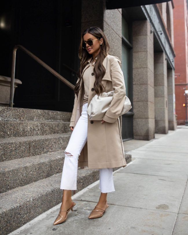 fashion blogger mia mia mine wearing a trench coat from express