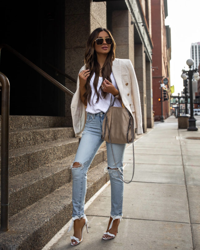 fashion blogger mia mia mine wearing a spring work wear outfit from saks fifth avenue