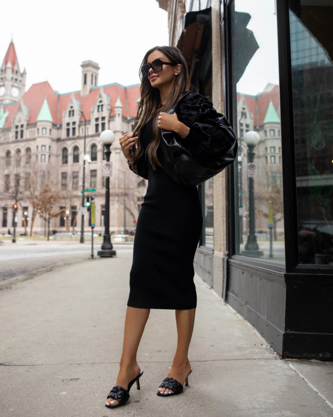 fashion blogger mia mia mine wearing a black eyelet dress for spring