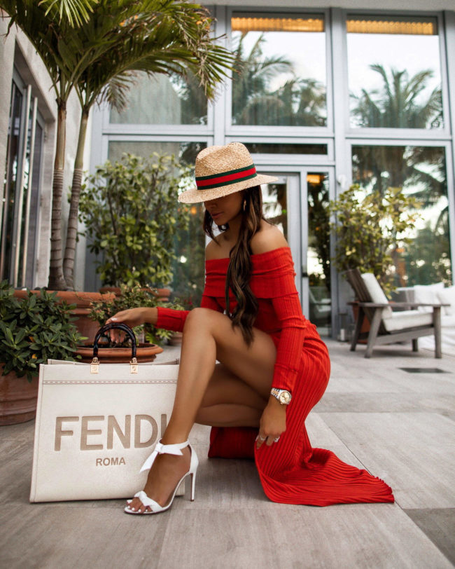fashion blogger mia mia mine wearing a red matching set from revolve in miami
