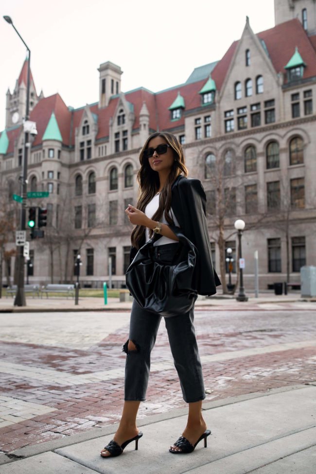 fashion blogger mia mia mine wearing cropped mom jeans from express