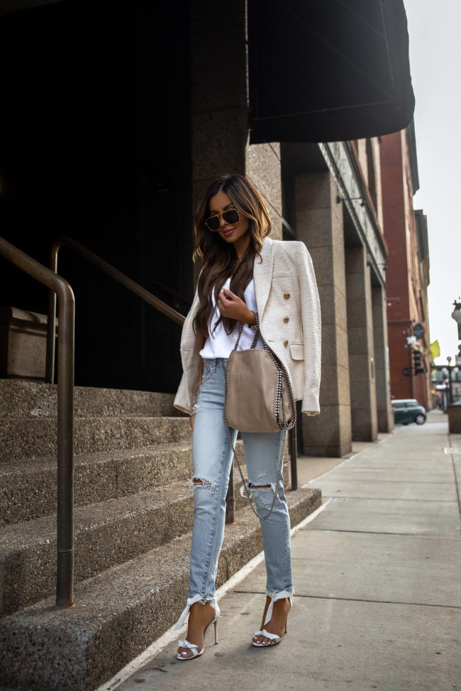 fashion blogger wearing an outfit from saks fifth avenue for spring