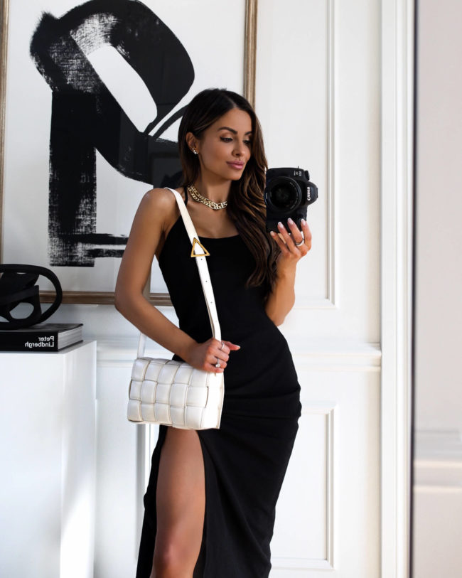 fashion blogger mia mia mine wearing a black dress from goodnight macaroon