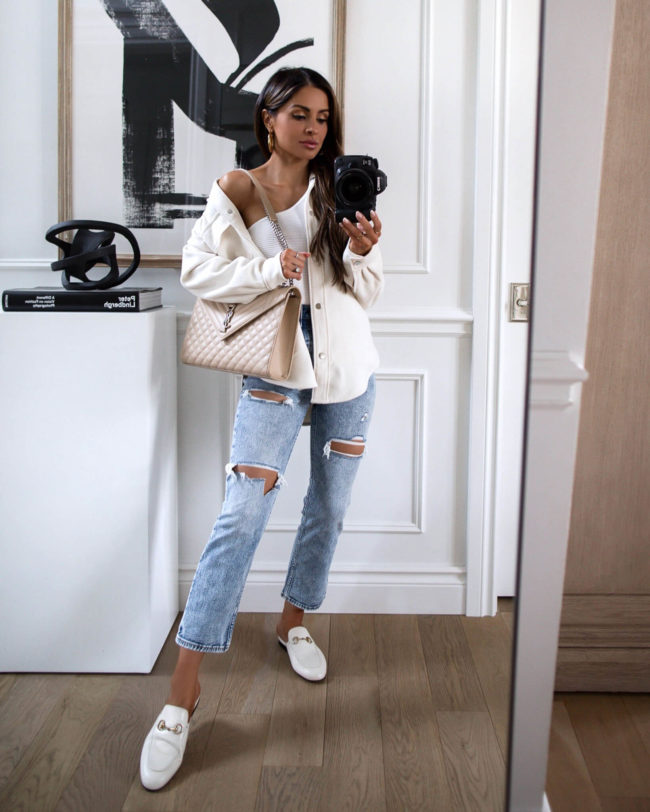 fashion blogger mia mia mine wearing a white shacket from abercrombie