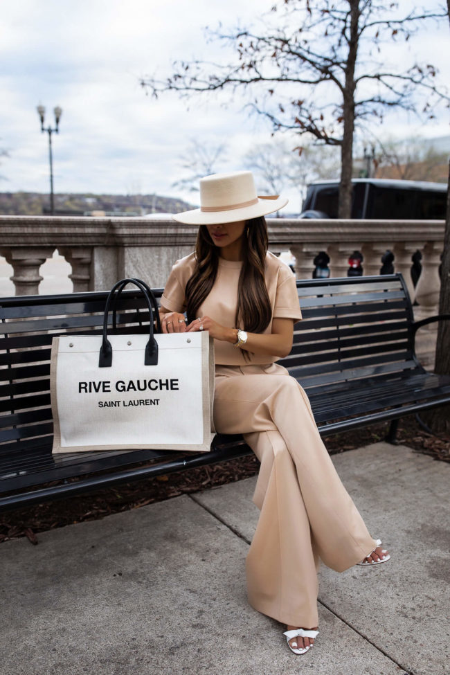 fashion blogger mia mia mine wearing a camel outfit from saks fifth avenue