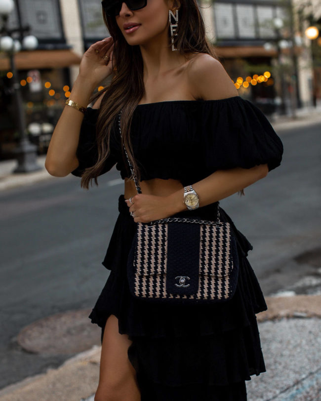 fashion blogger mia mia mine wearing a chanel bag from vivrelle