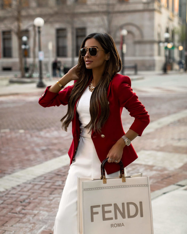 fashion blogger mia mia mine wearing a red blazer from karen millen