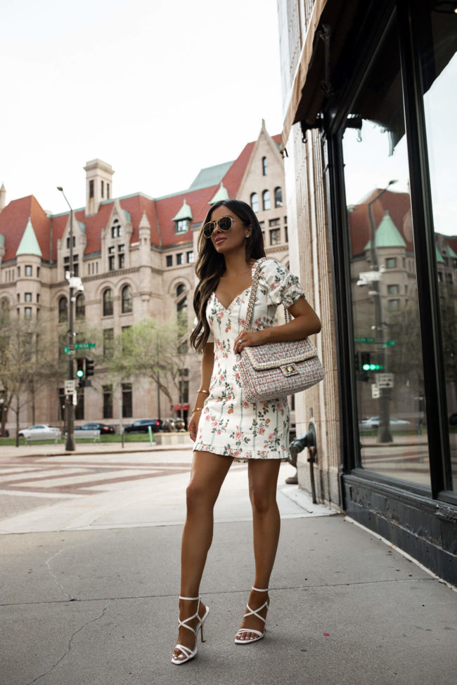 fashion blogger mia mia mine wearing a floral dress from saks off 5th for spring