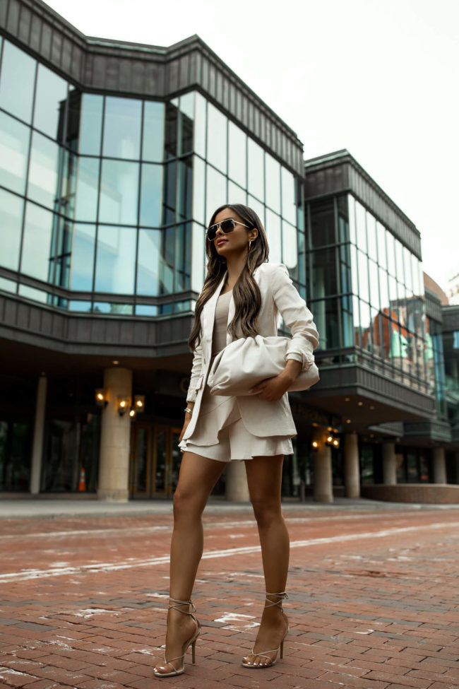 fashion blogger mia mia mine wearing a linen set from express for summer