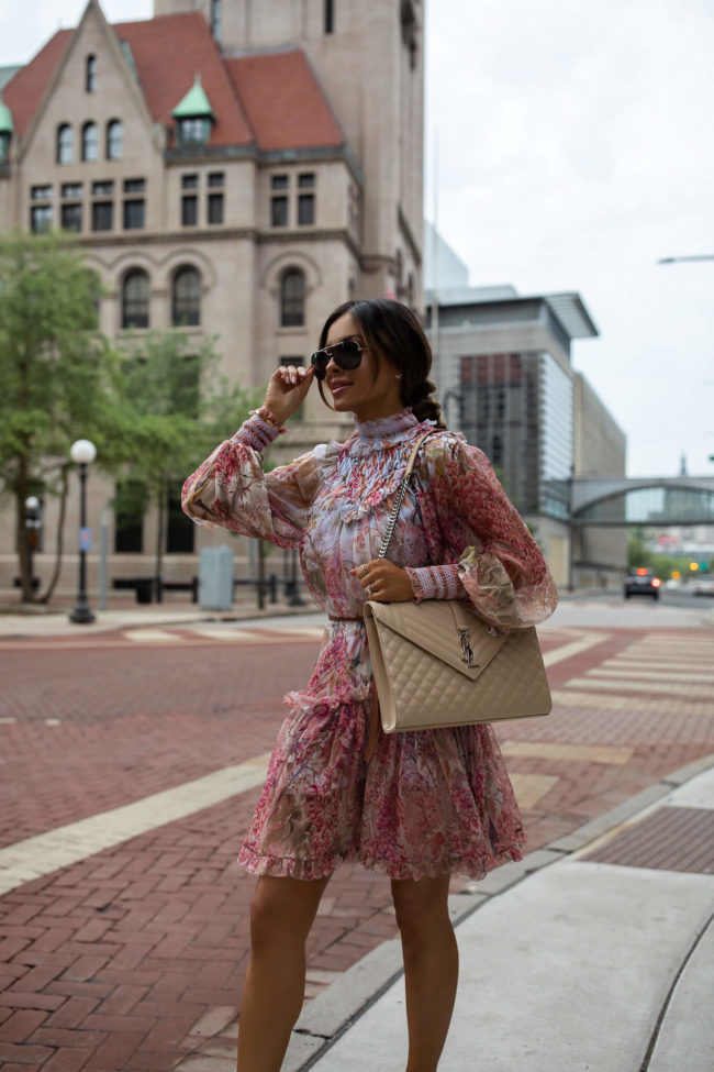 fashion blogger mia mia mine wearing a zimmerman dress from saks fifth avenue