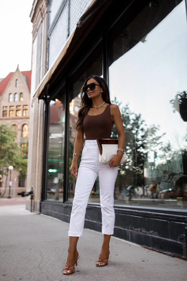 fashion blogger mia mia mine wearing a bodysuit from express