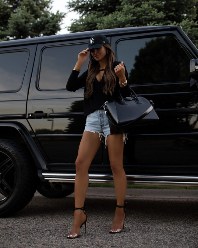 mia mia nmne wearing a ny yankees cap