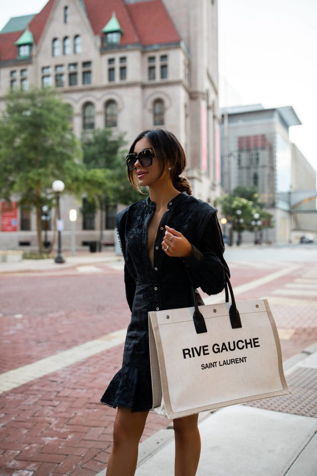 fashion blogger wearing a veronica beard black dress for summer