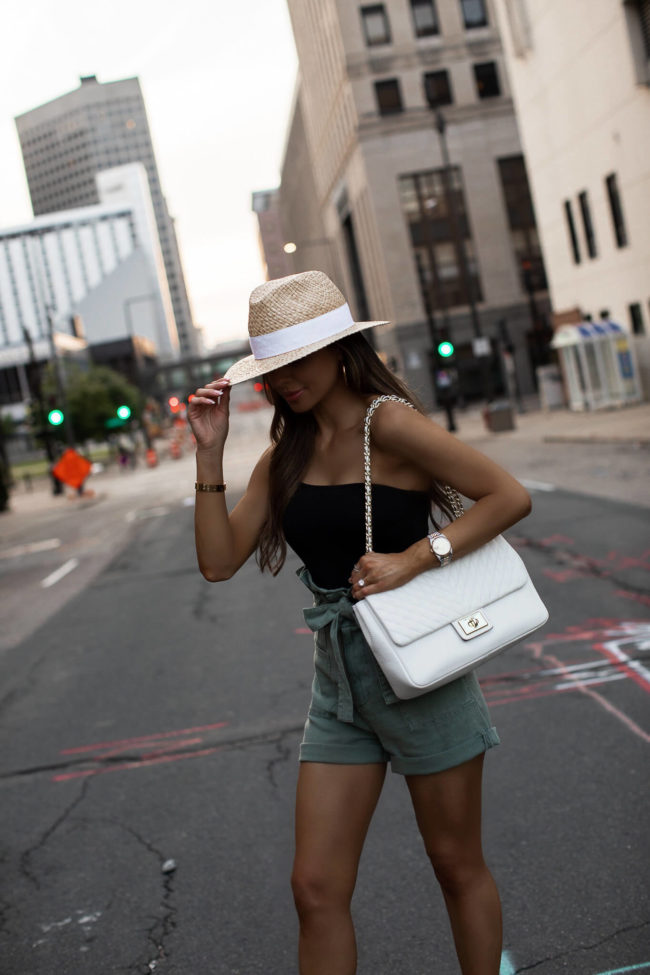 fashion blogger mia mia mine wearing a summer outfit from saks off 5th