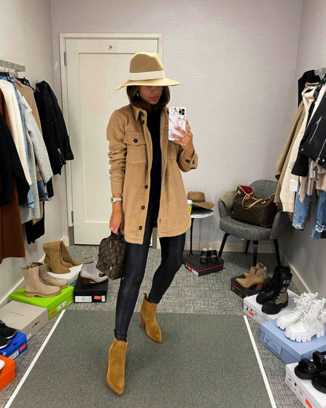 fashion blogger mia mia mine wearing a camel shirt jacket with spanx faux leather leggings