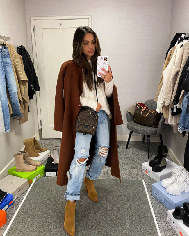 fashion blogger mia mia mine wearing a brown wrap coat and marc fisher booties from the nsale