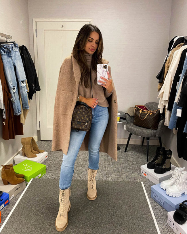 fashion blogger mia mia mine wearing a fall outfit from the nsale with beige combat boots and a camel cardigan