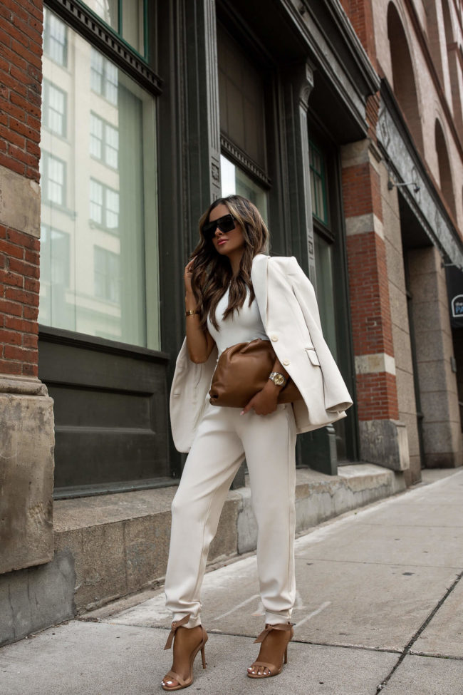 fashion blogger wearing a white suit from express for summer