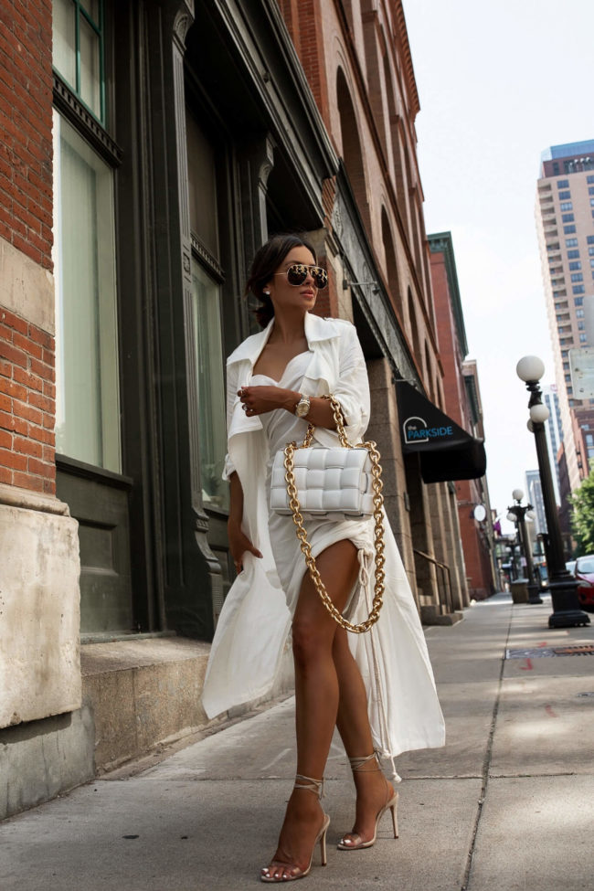 mia mia mine wearing a white linen trench coat from nordstrom 