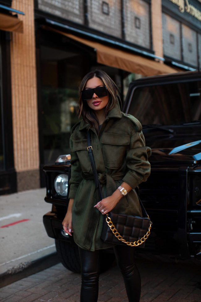 fashion blogger wearing an olive shacket from walmart's scoop line for fall